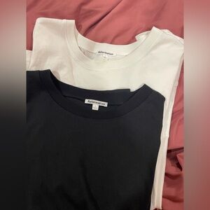 2 Reformation long sleeve shirts, black and white, size L